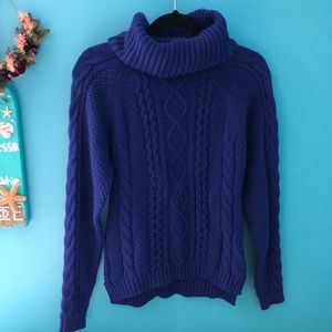 Blue turtleneck knit sweater